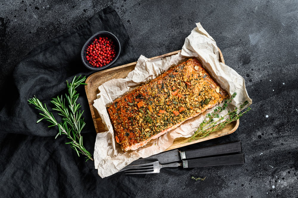 Whole Charcoal-Grilled Salmon with Mediterranean Olive & Hearts of Palm Topping